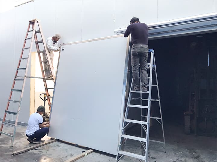 Install the walk in cooler door Install the walk in cooler door